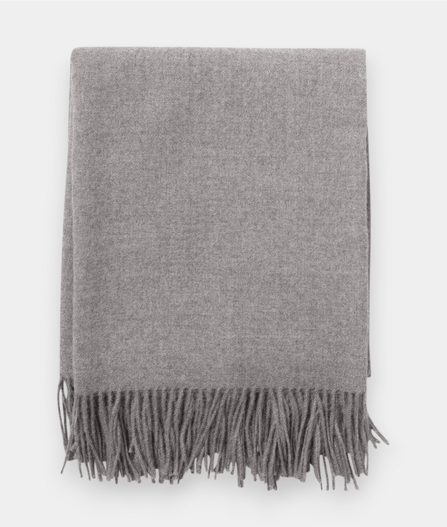 Gray wool scarf with tasseled fringe, displayed flat on a white background - Industry of All Nations