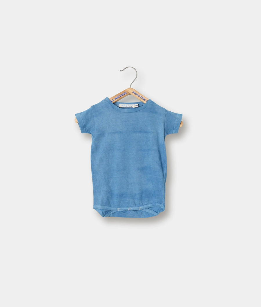 Blue cotton t-shirt hanging on hanger - Industry of All Nations