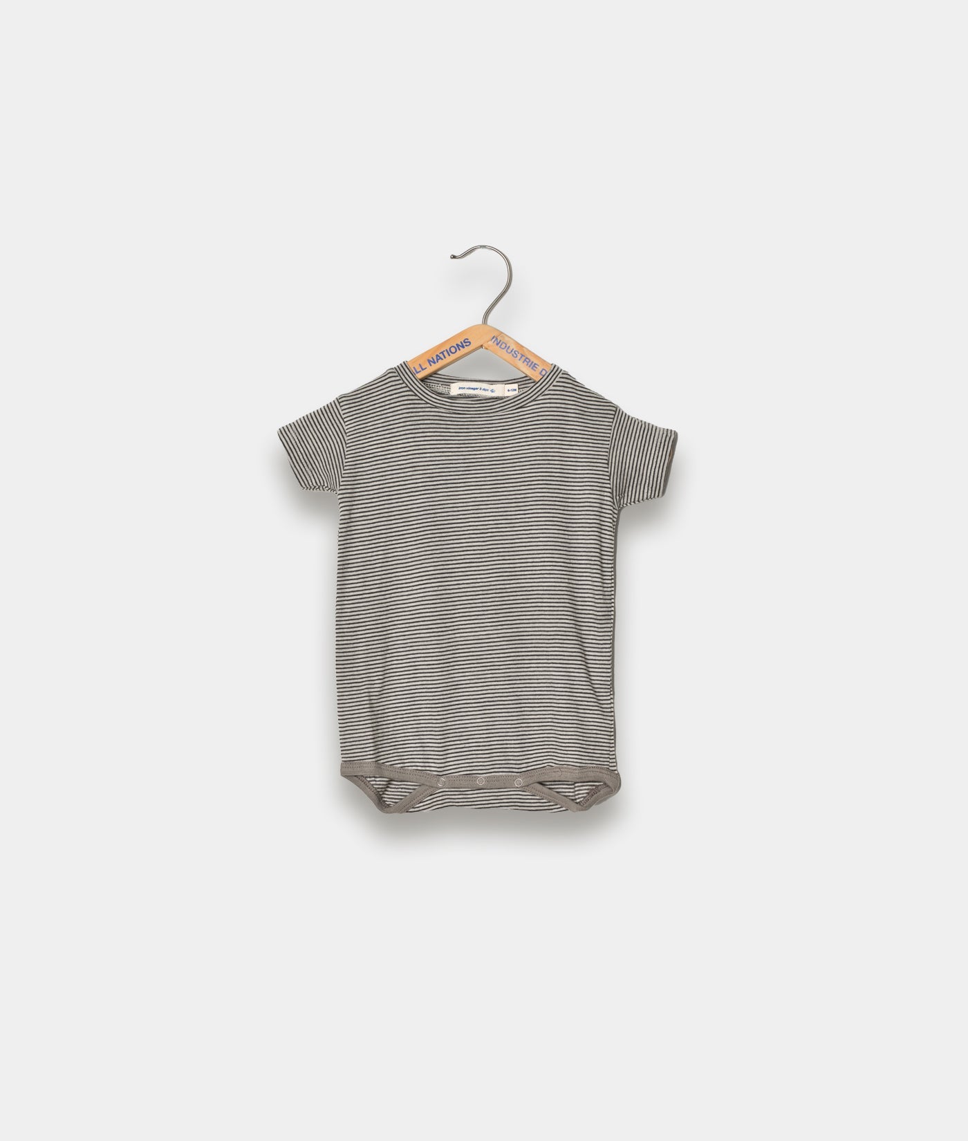 A grey and white striped short-sleeve t-shirt displayed on a hanger - Industry of All Nations