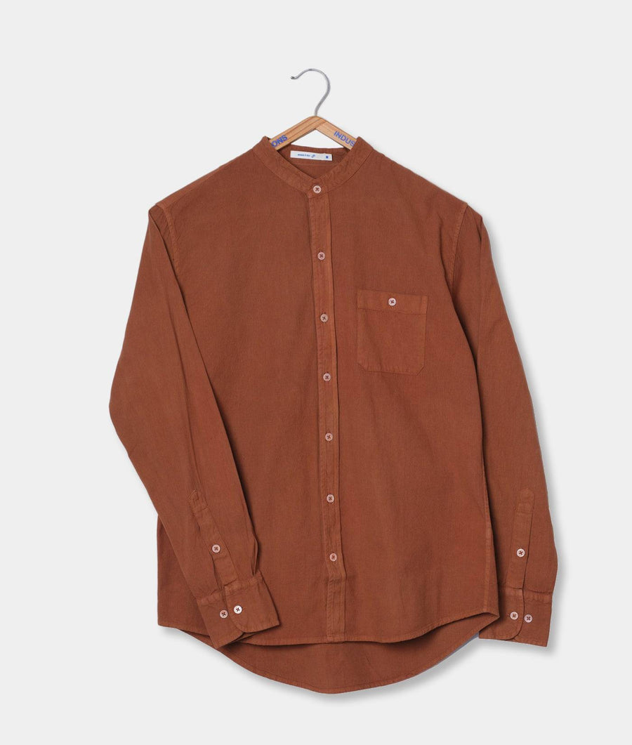 A brown button-up shirt from Industry of All Nations displayed on a hanger against a plain background.