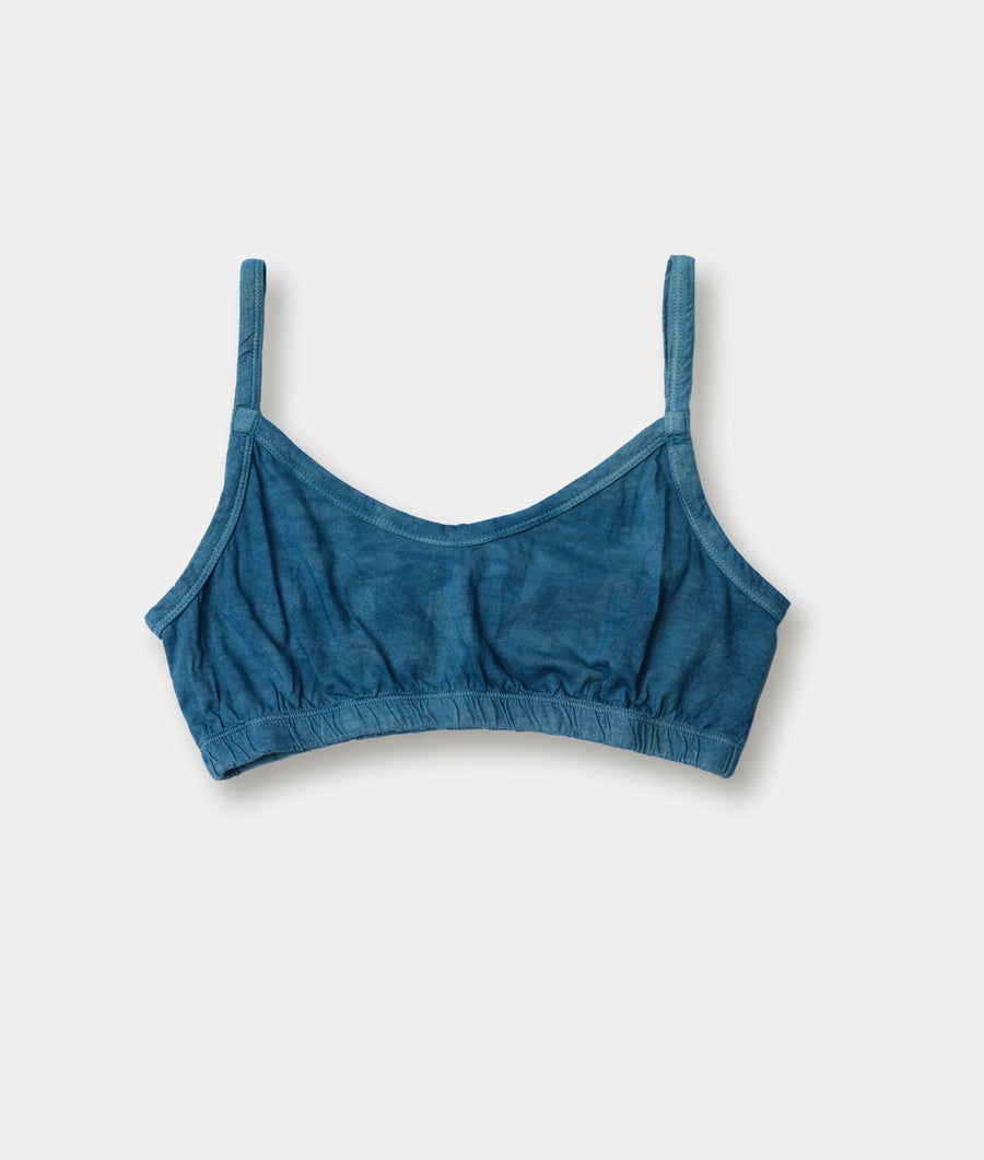 A blue denim-like bra top displayed on a flat white background - Industry of All Nations