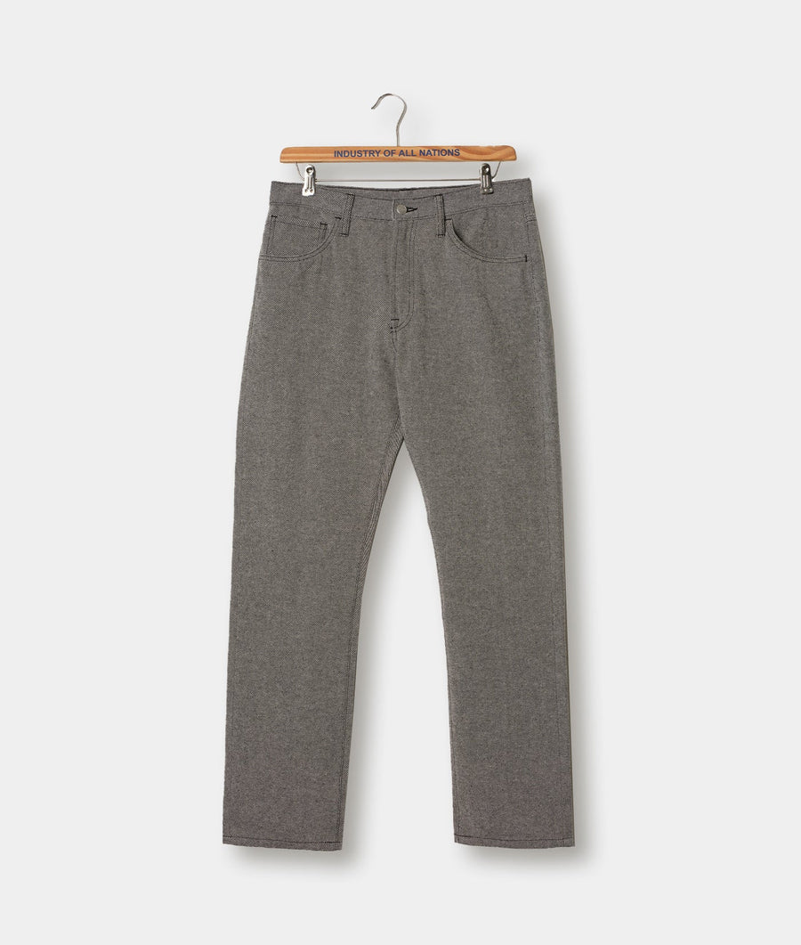 Gray cotton pants displayed on a hanger with the brand name "Industry of All Nations" visible on the hanger - Industry of All Nations