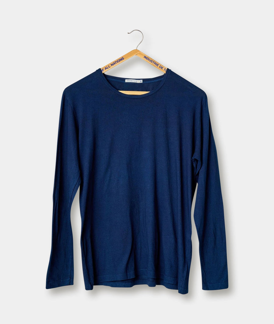 Navy blue long sleeve t-shirt displayed on a wooden hanger - Industry of All Nations
