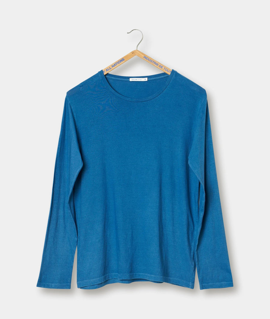 A bright blue long-sleeved t-shirt displayed on a wooden hanger against a plain background - Industry of All Nations