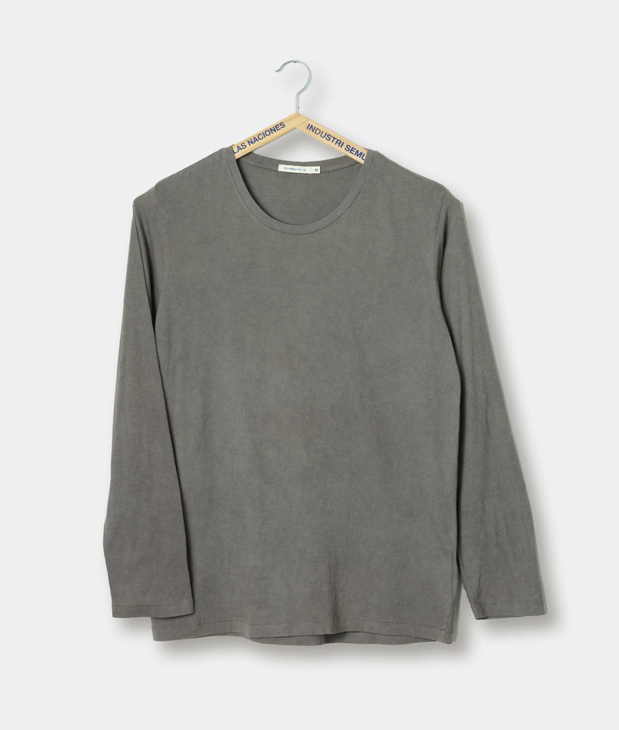 Long-sleeve gray t-shirt hung on a wooden hanger with "AS NACICNES INDUSTRI SEML" label - Industry of All Nations