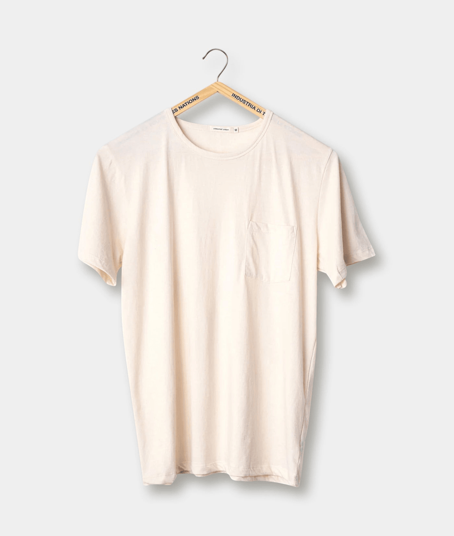 Cream-colored t-shirt displayed on a hanger with the "Industry of All Nations" branding visible - Industry of All Nations