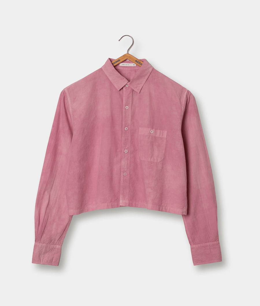 Pink collared button-up shirt hanging on a wooden hanger - Industry of All Nations