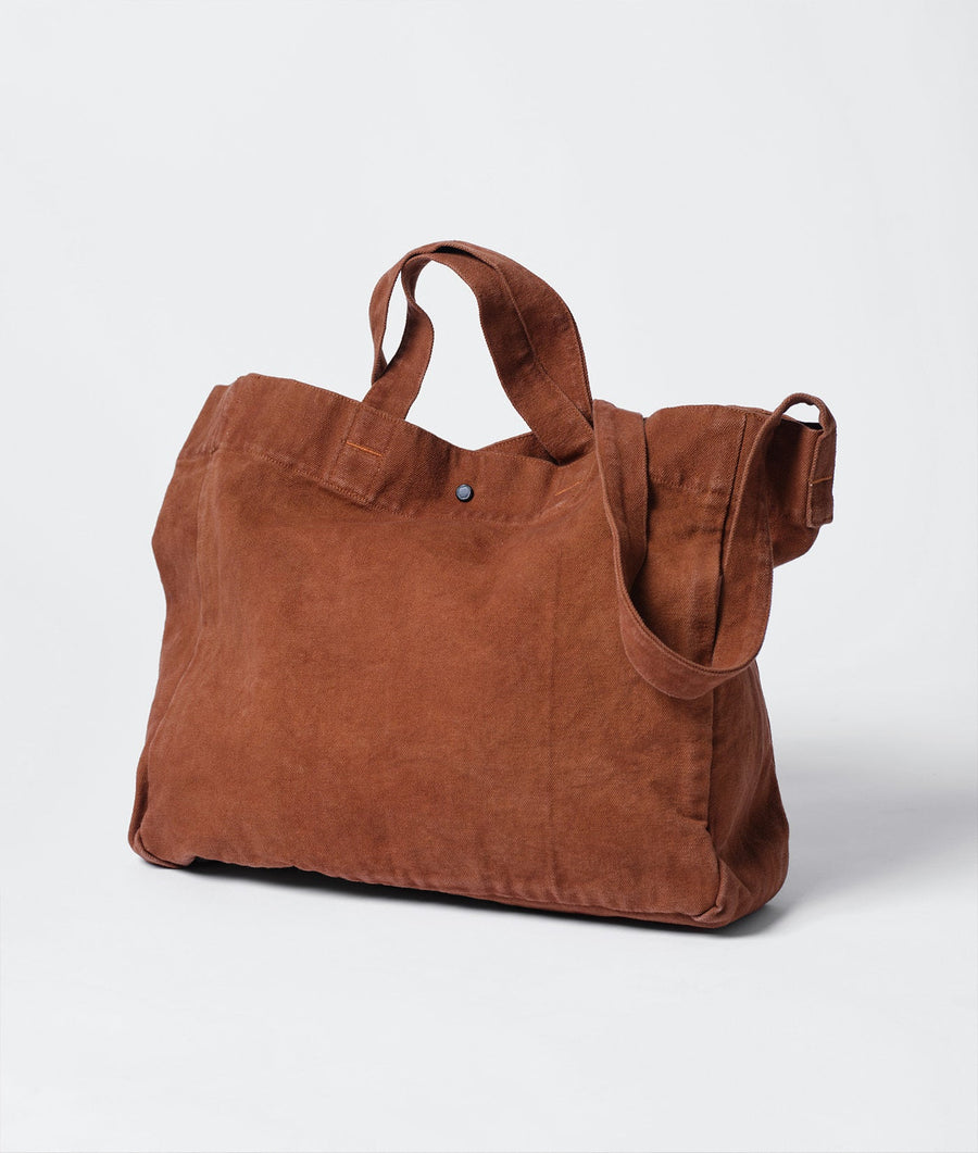 A brown cotton tote bag with dual carry handles, displayed on a white background - Industry of All Nations