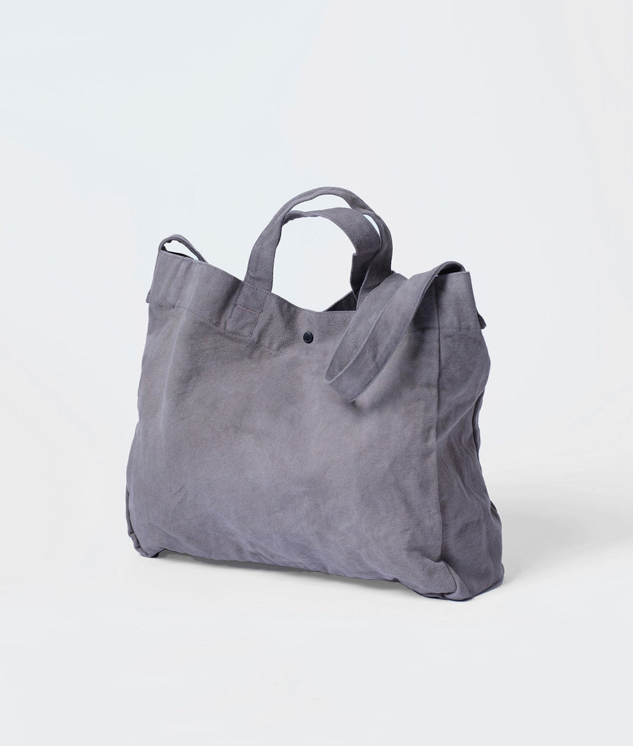Gray cotton tote bag with handles, displayed on a light background - Industry of All Nations