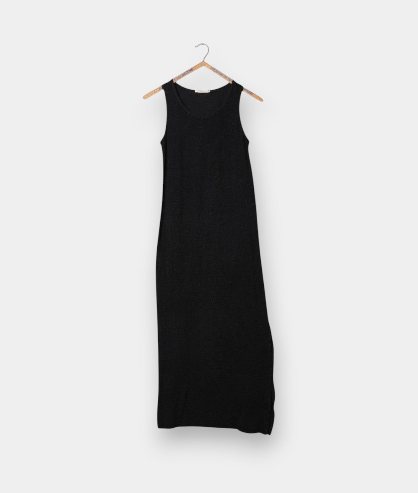 Industry of All Nations black organic cotton pique tank dress with a sleeveless design and textured knit fabric.