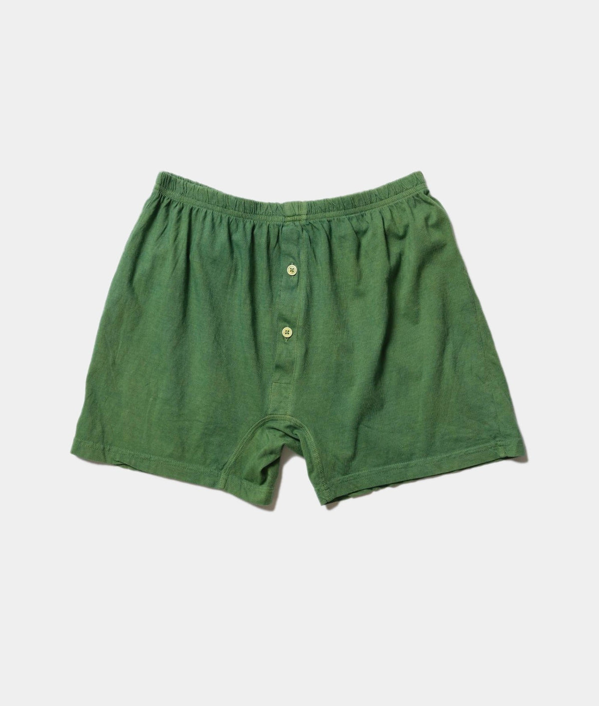 Green organic cotton boxer shorts, displayed flat lay against a white background - Industry of All Nations