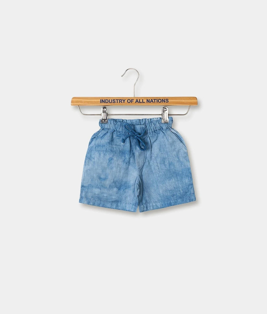 Blue denim shorts with drawstring waist hanging on a wooden hanger with "Industry of All Nations" text - Industry of All Nations