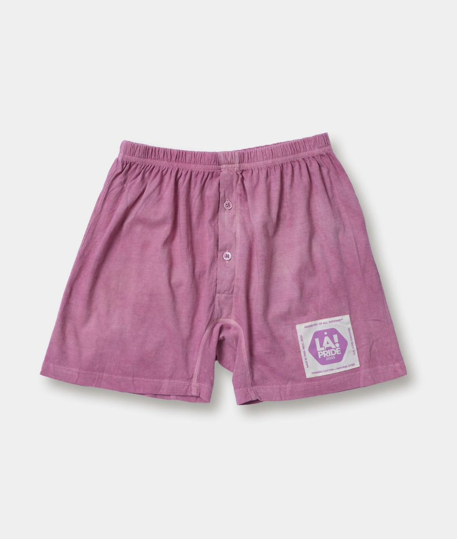 Purple colored cotton boxers/shorts displayed in a flat lay shot with the LA Pride 2023 logo visible - Industry of All Nations