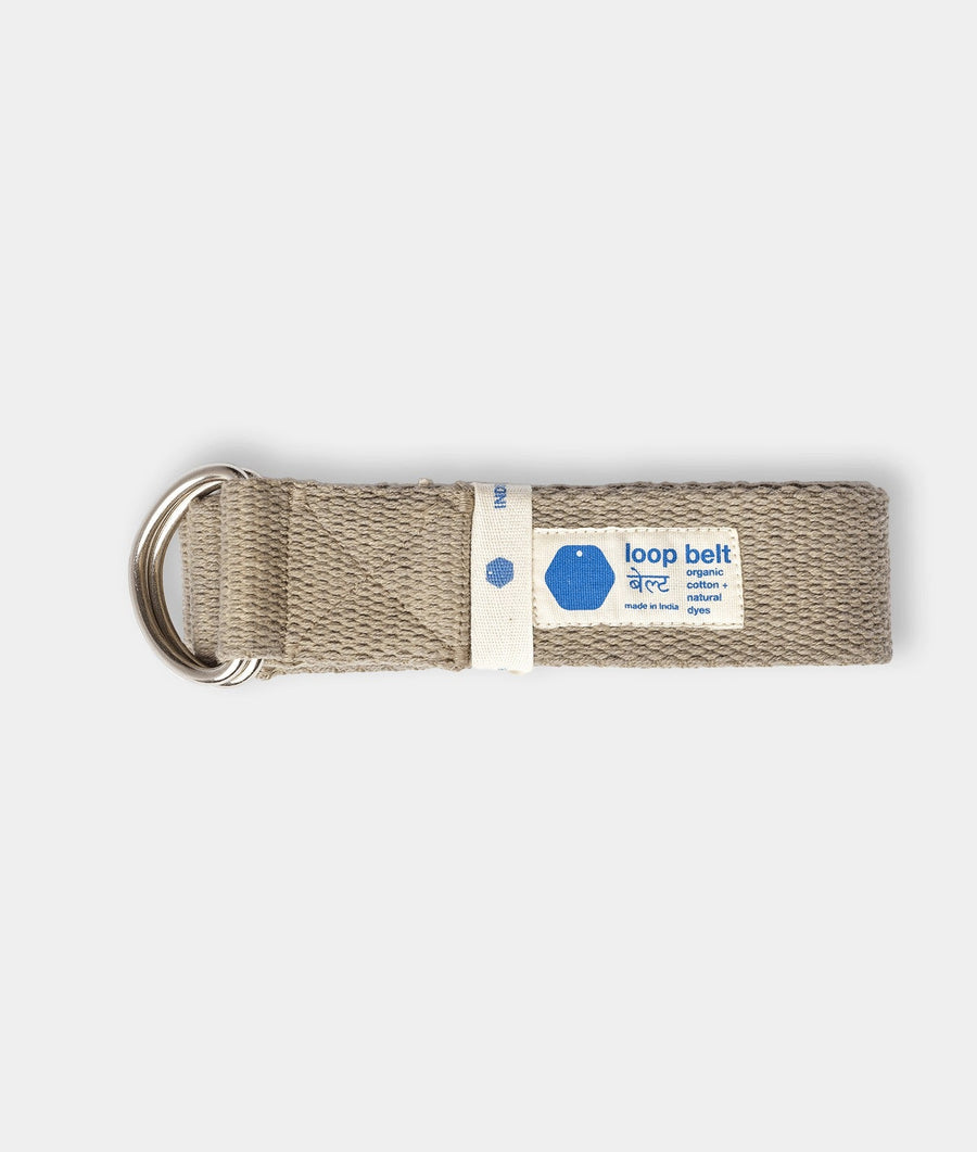 Tan organic cotton loop belt with round metal ring closure, displayed flat - Industry of All Nations