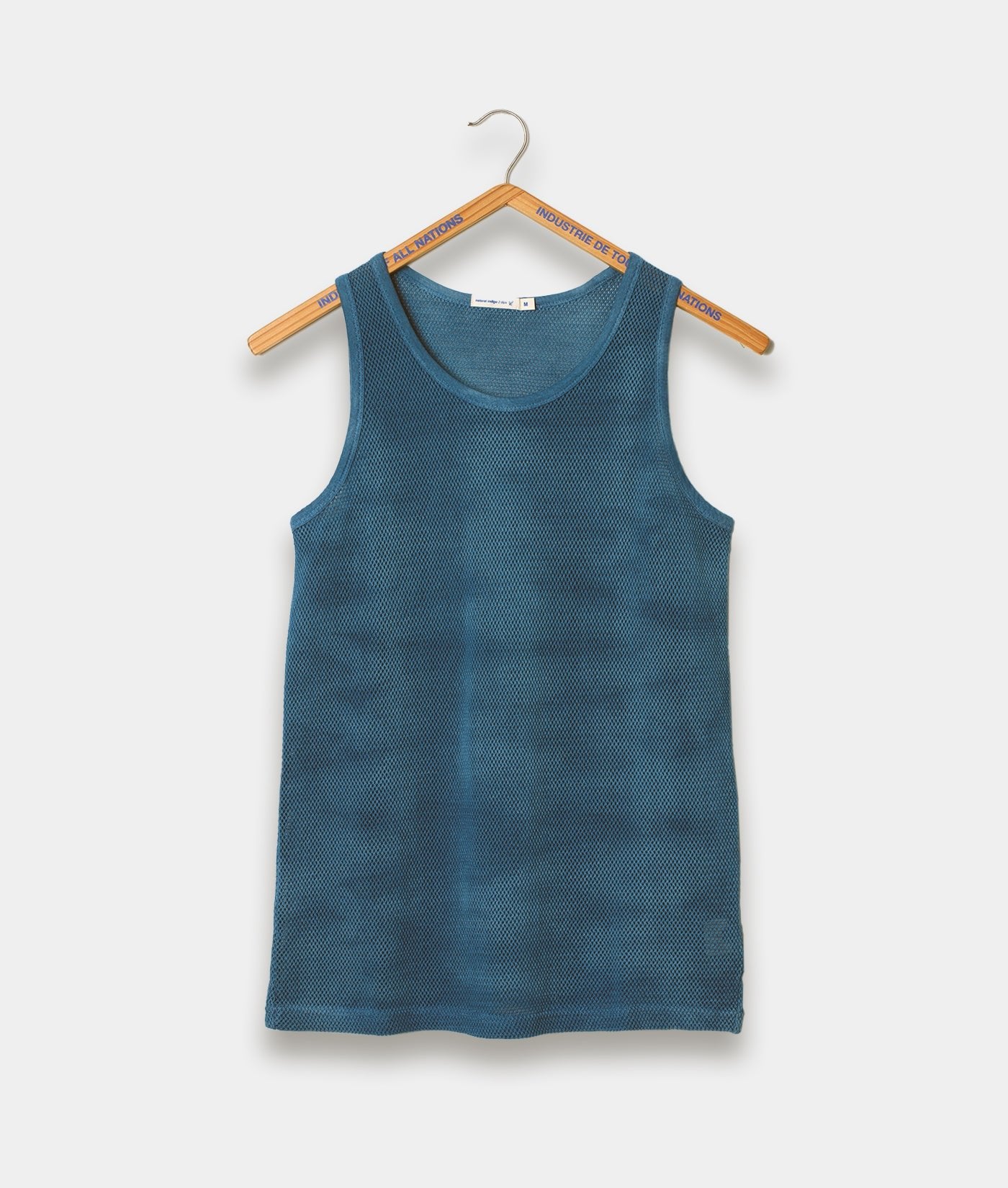 Teal blue mesh tank top hanging on wooden hanger with brand name 'Industrie De Tous' printed - Industry of All Nations