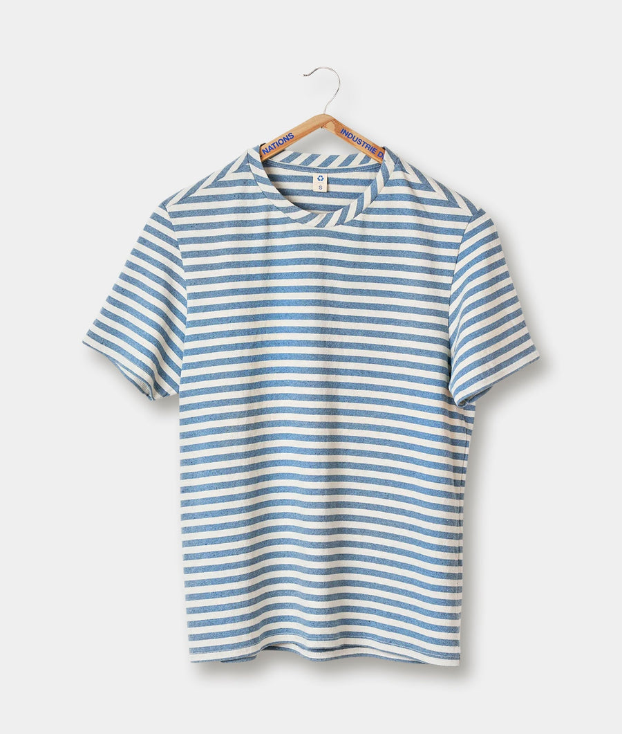 A striped cotton t-shirt in blue and white, displayed on a hanger - Industry of All Nations