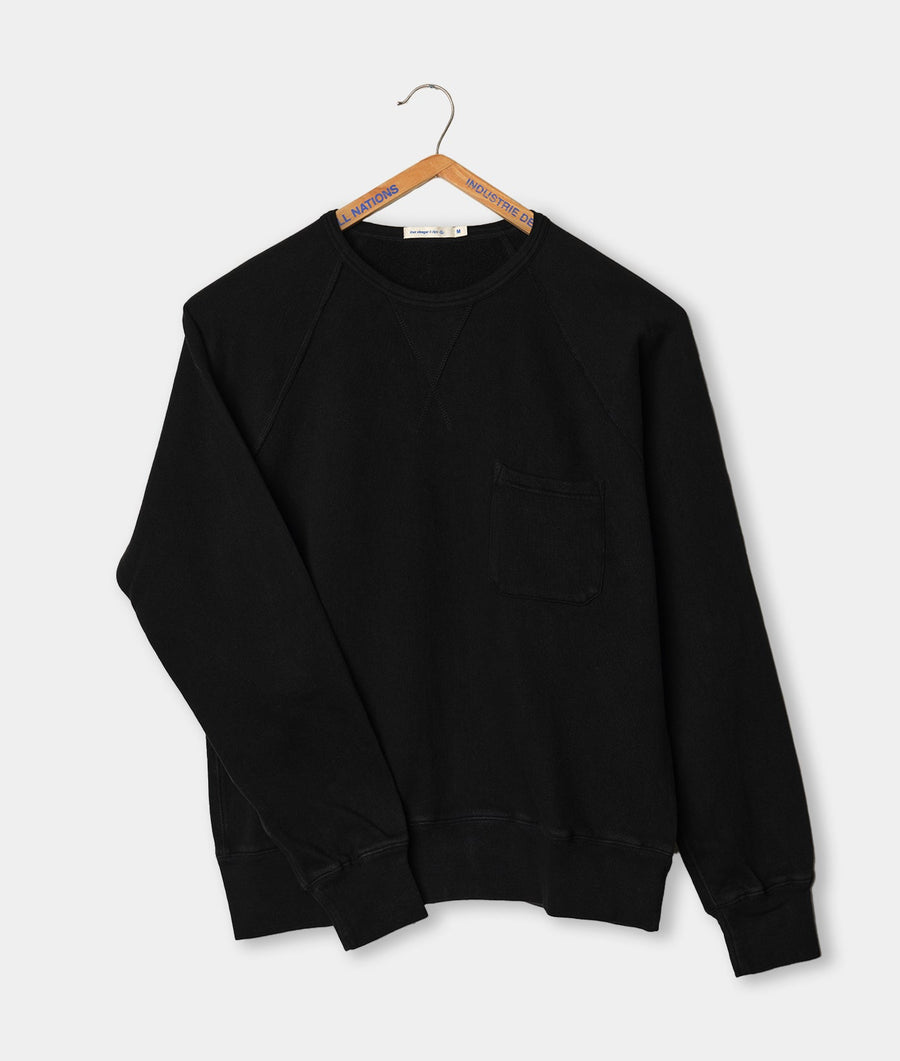 Black organic cotton crew neck sweatshirt on wooden hanger - Industry of All Nations