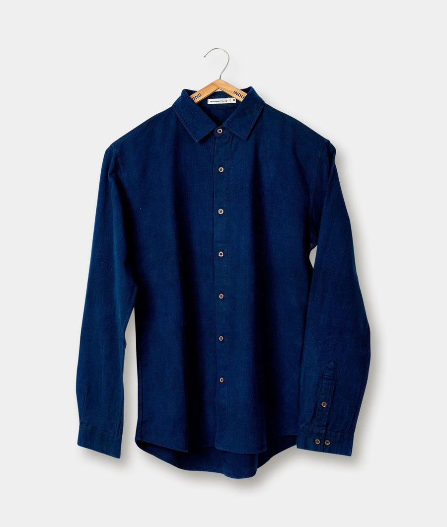 Navy blue button-down shirt hanging on a wooden hanger - Industry of All Nations