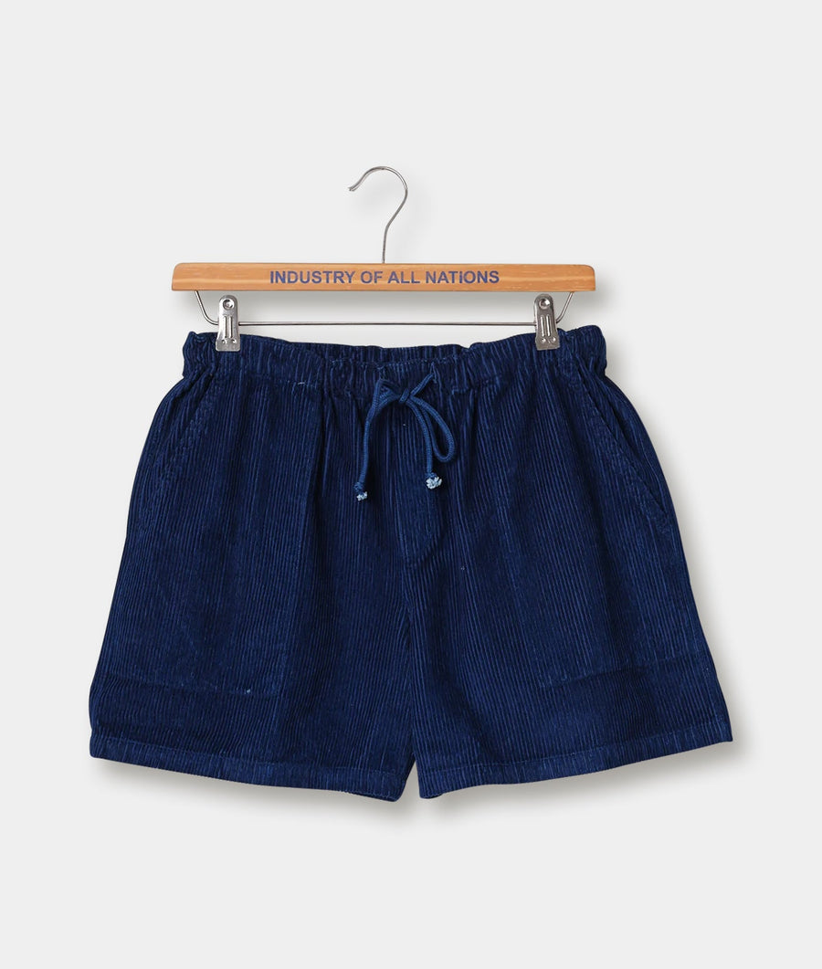 Navy blue corduroy drawstring shorts displayed on a wooden hanger with the brand name 'Industry of All Nations' - Industry of All Nations