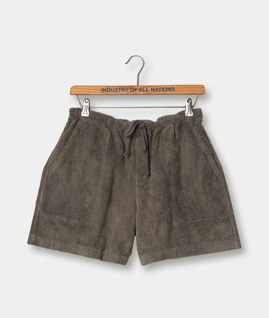 Gray corduroy drawstring shorts displayed on a wooden hanger with a "Industry of All Nations" text label - Industry of All Nations