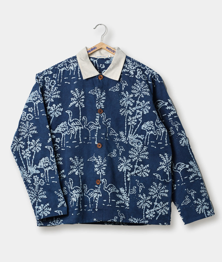 Navy blue coat with a white collar and flamingo pattern, displayed on a hanger - Industry of All Nations