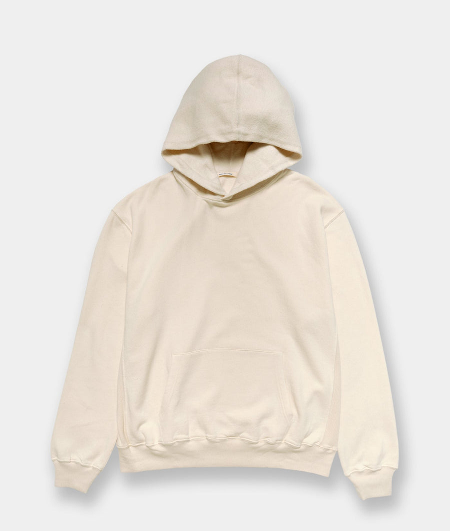 Cream-colored hooded sweatshirt displayed flat against a white background - Industry of All Nations