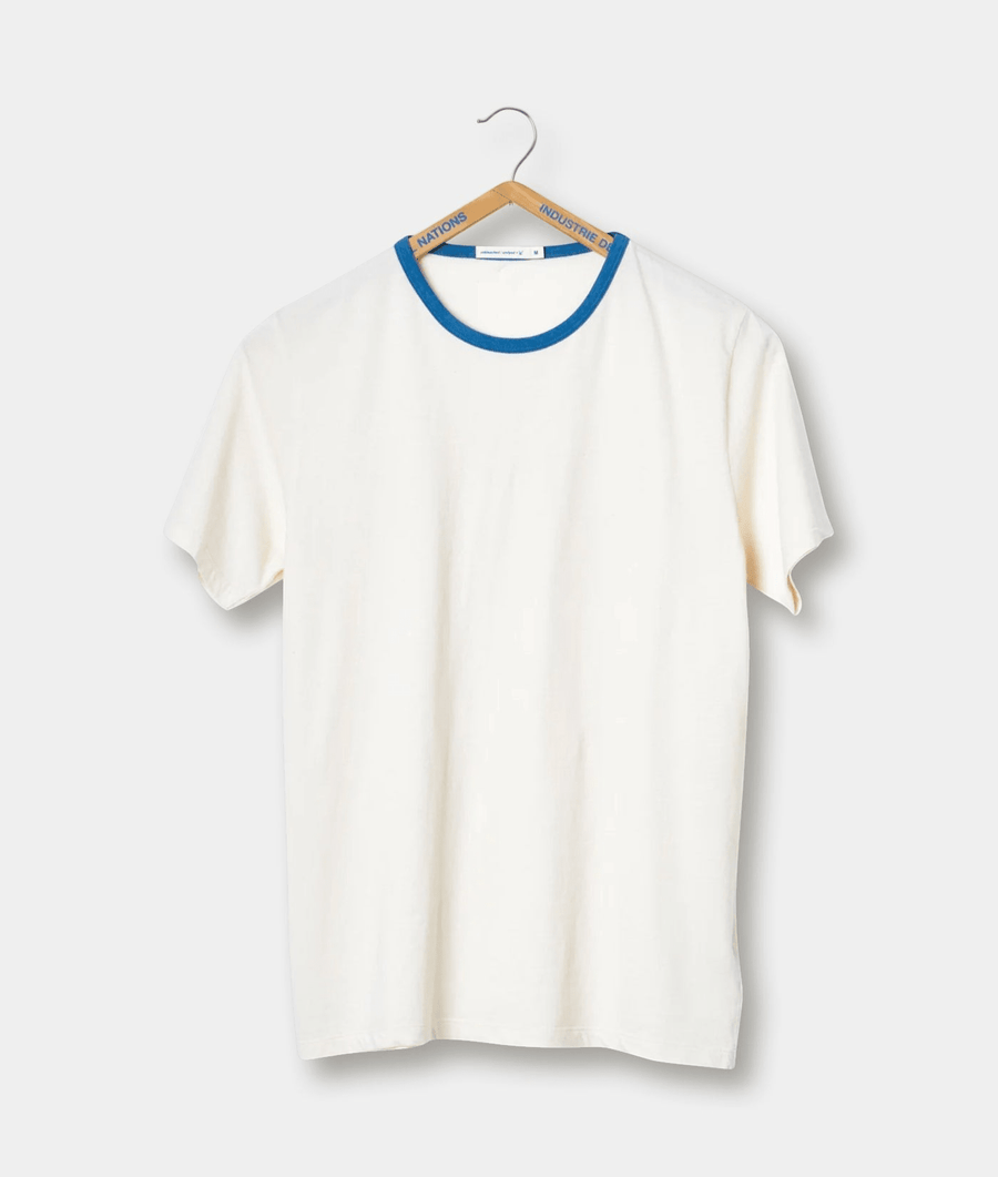 White t-shirt with blue trim, hanging on wooden hanger - Industry of All Nations