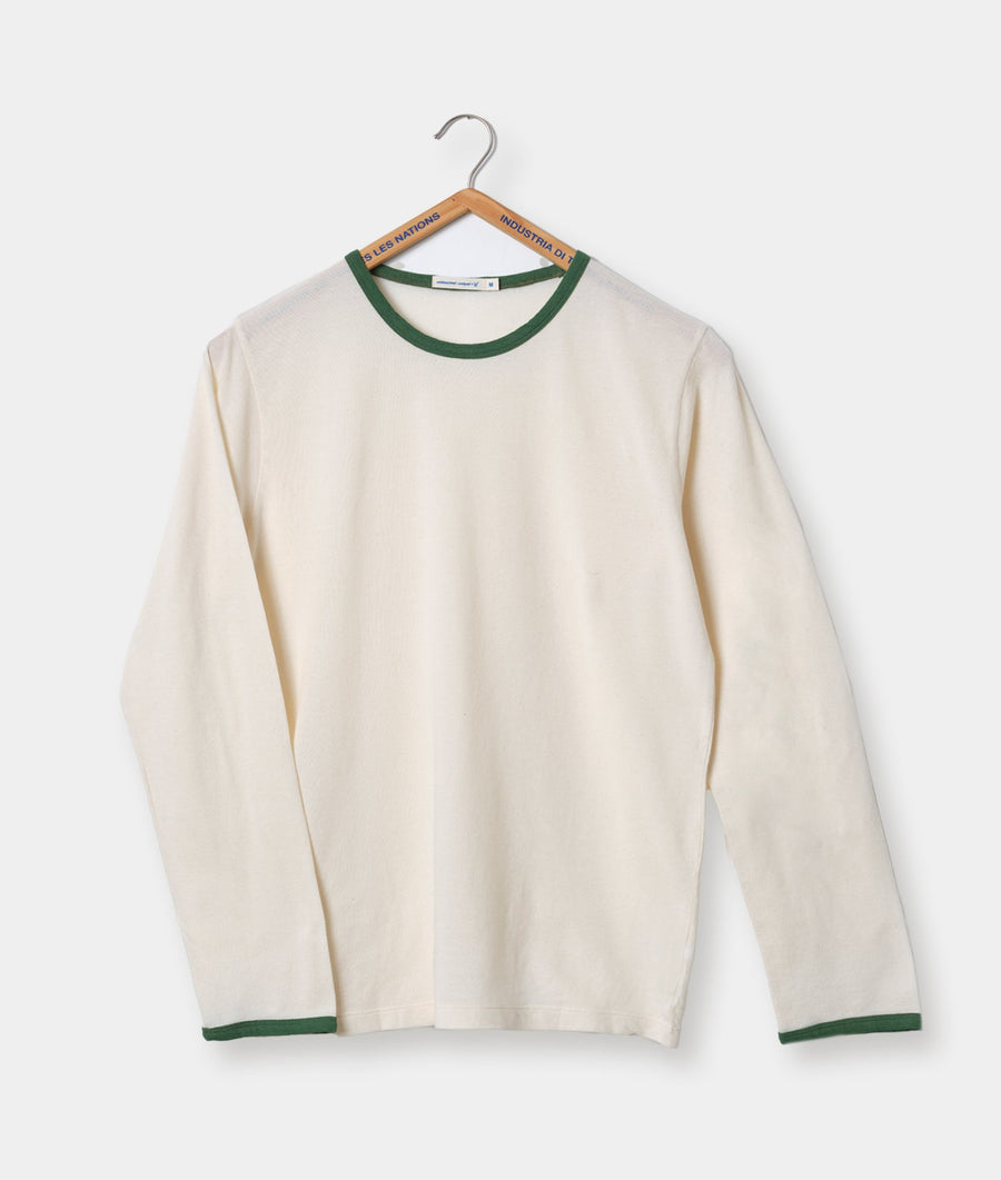 A cream long-sleeve crew neck shirt with green trim, displayed on a wooden hanger - Industry of All Nations