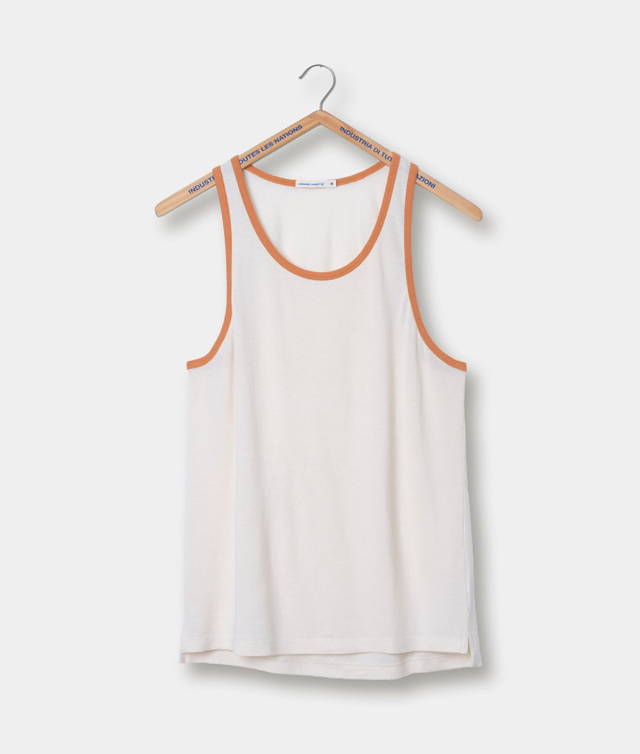 A white tank top with orange trim, displayed on a wooden hanger - Industry of All Nations