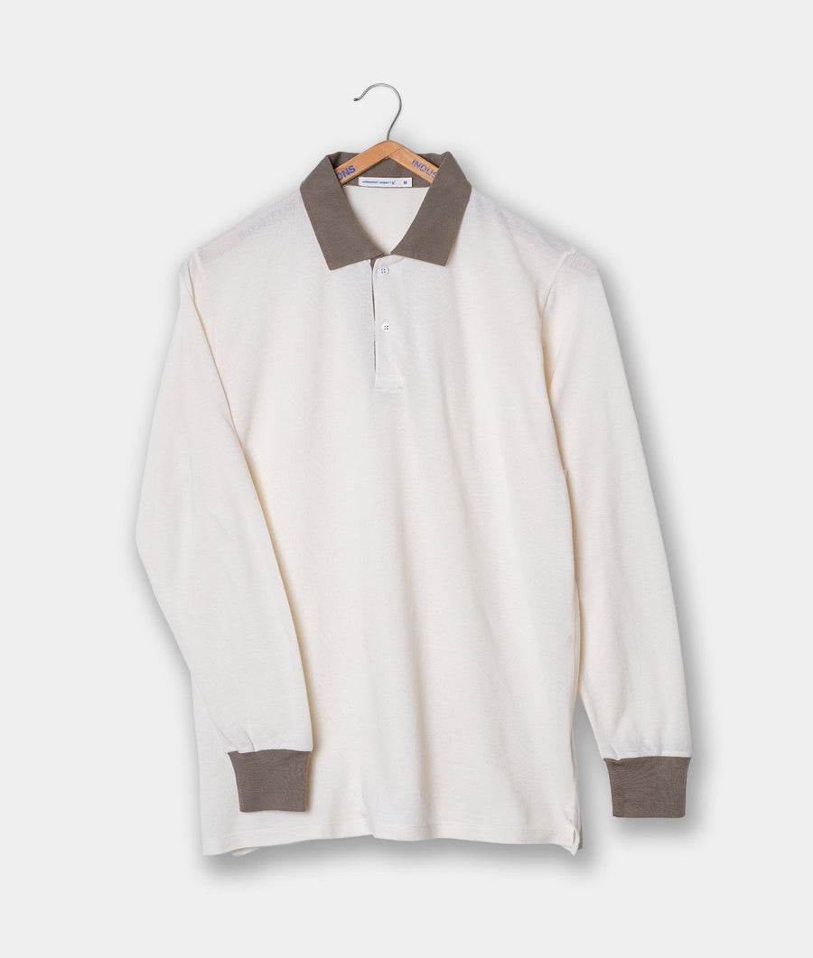 A long-sleeved white polo shirt with a taupe collar, displayed on a hanger against a white background - Industry of All Nations