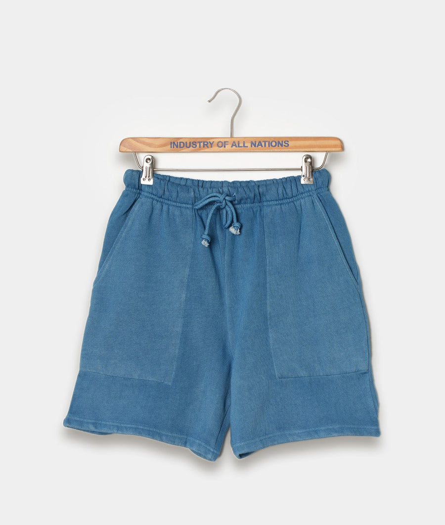 Blue drawstring shorts displayed on a wooden hanger with "Industry of All Nations" text - Industry of All Nations