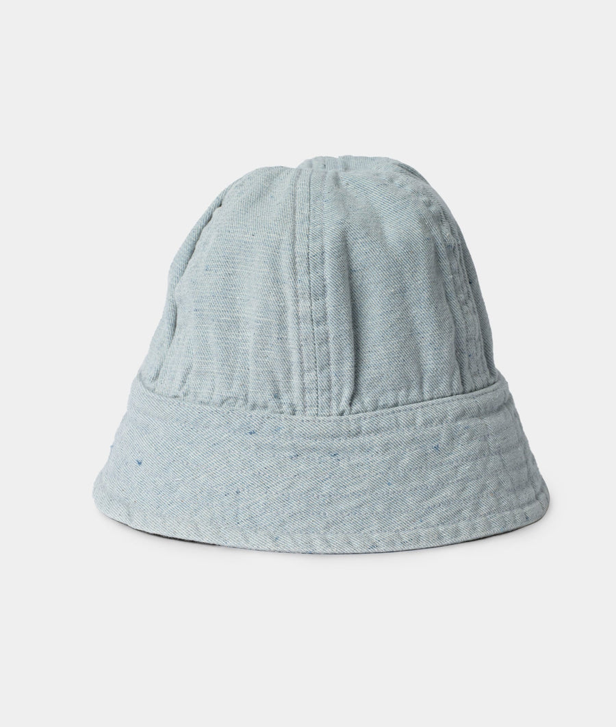 A grey cotton bucket hat with a ribbed texture and relaxed silhouette, displayed on a plain white background - Industry of All Nations