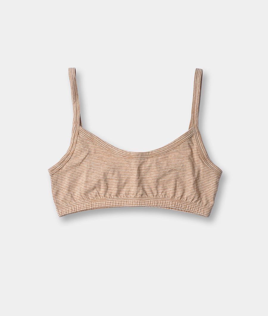 Tan and white striped knit sports bra with wide straps laid flat on a white background - Industry of All Nations