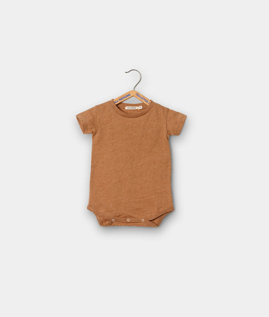 Brown organic cotton baby onesie displayed on a hanger - Industry of All Nations
