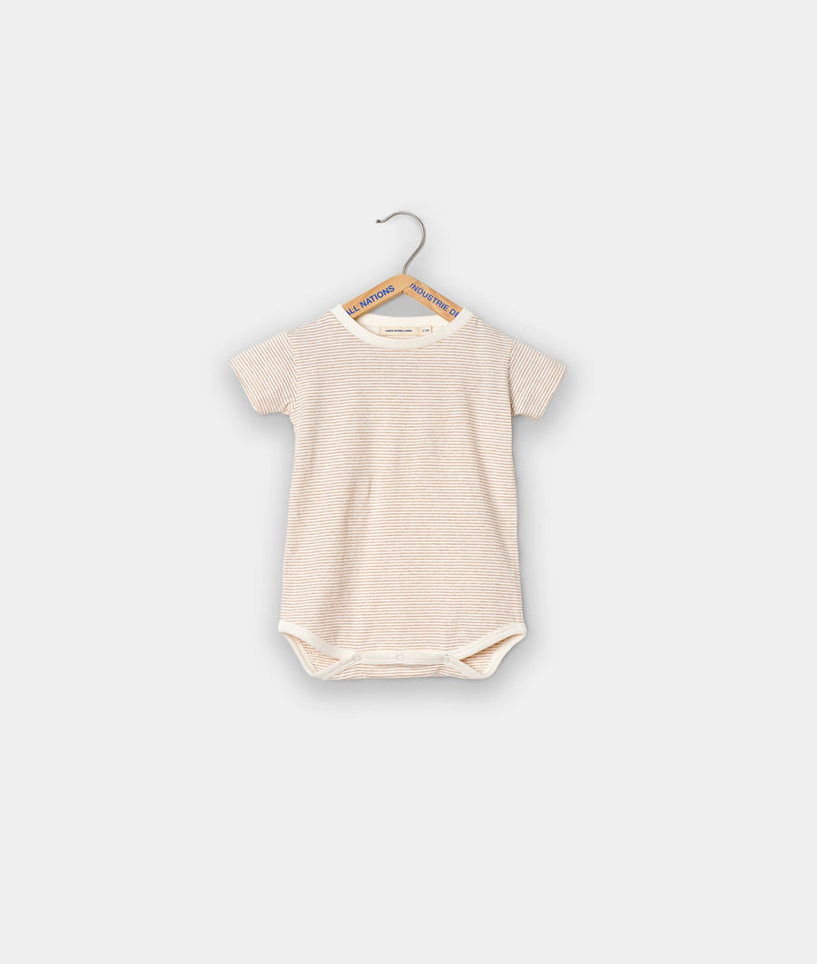 Striped beige infant bodysuit displayed on a hanger against a white background - Industry of All Nations