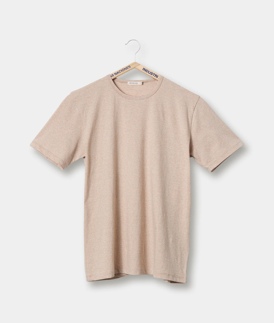 Beige ribbed knit t-shirt displayed on a hanger - Industry of All Nations