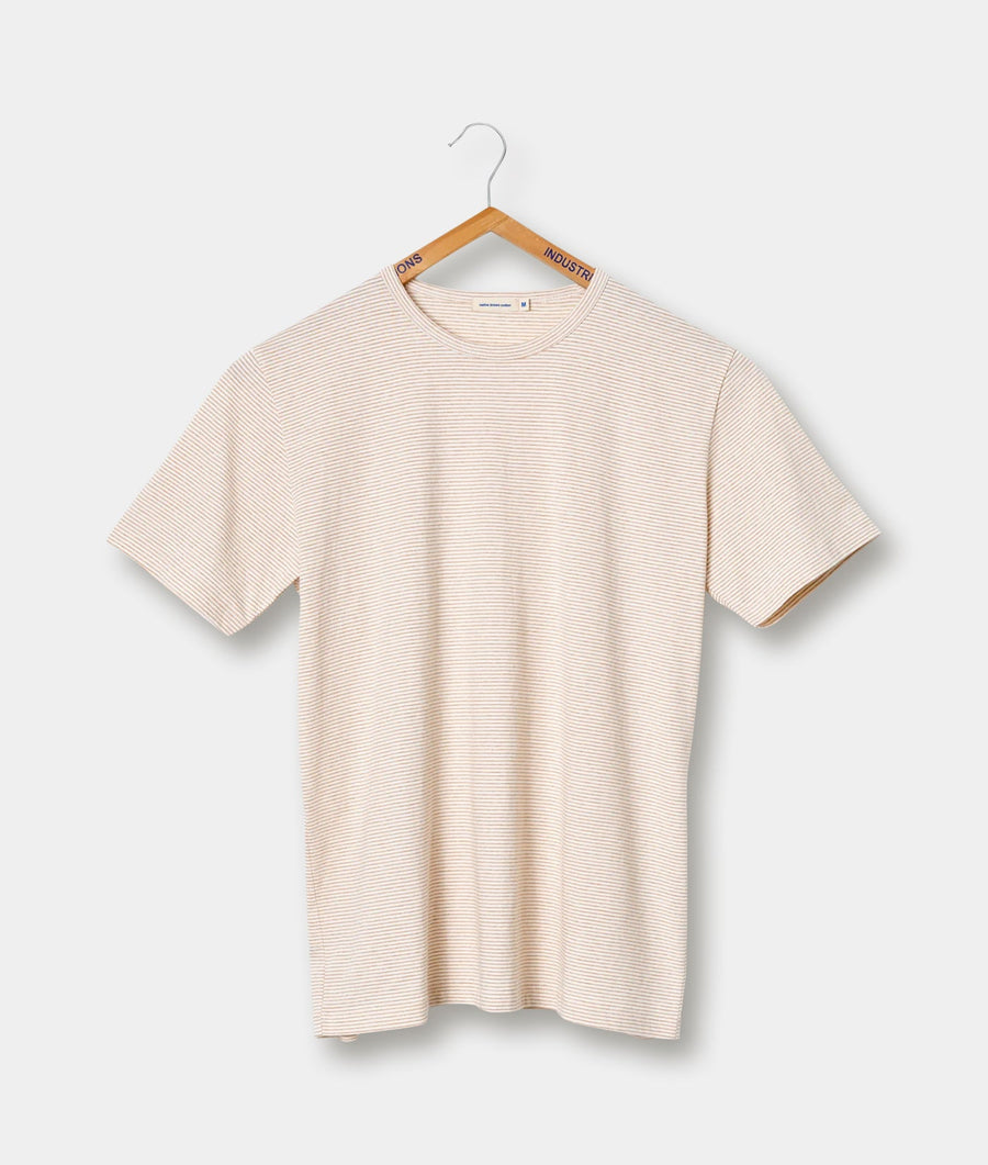 Striped beige cotton t-shirt displayed on a wooden hanger - Industry of All Nations