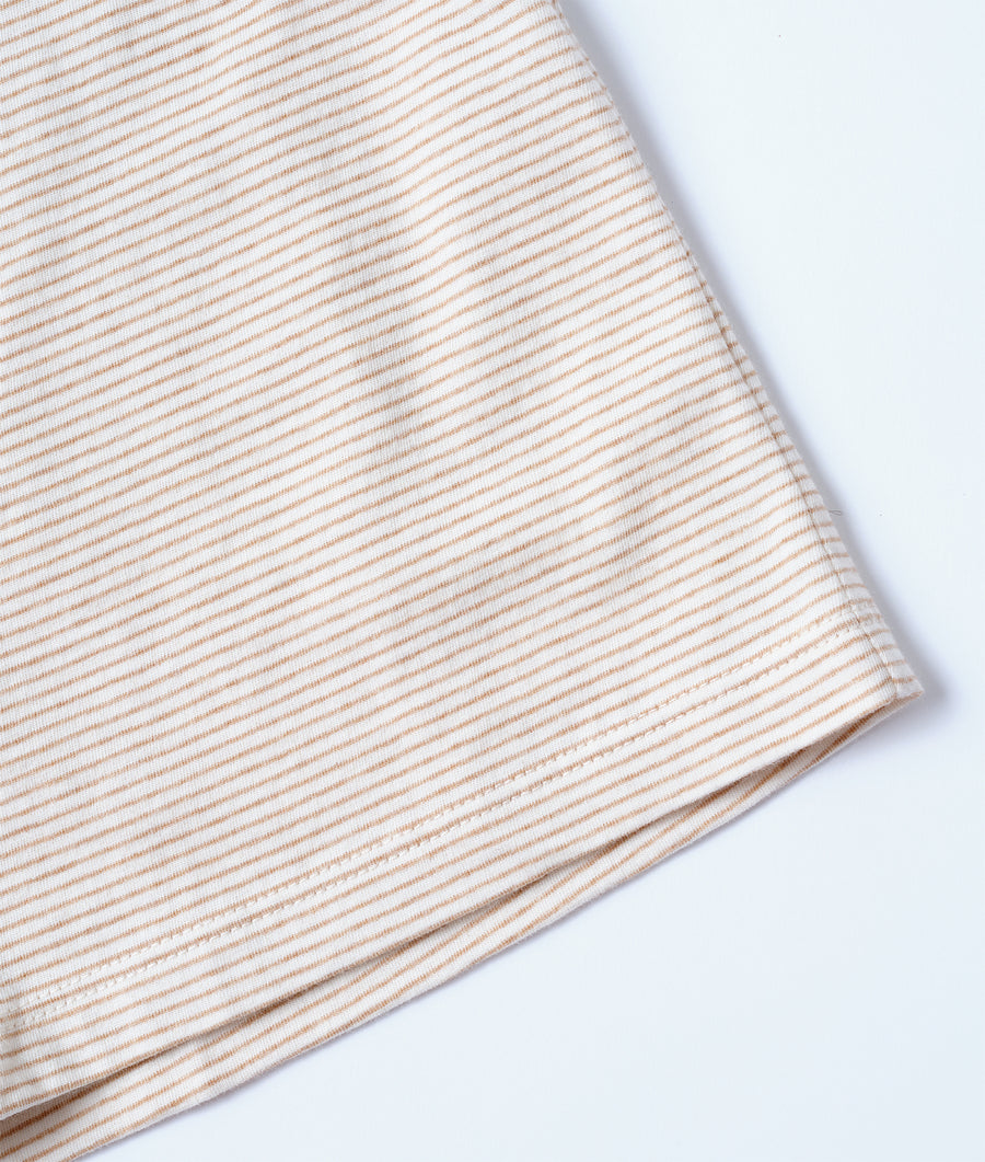 Tan and white striped knit fabric in a flat lay composition - Industry of All Nations
