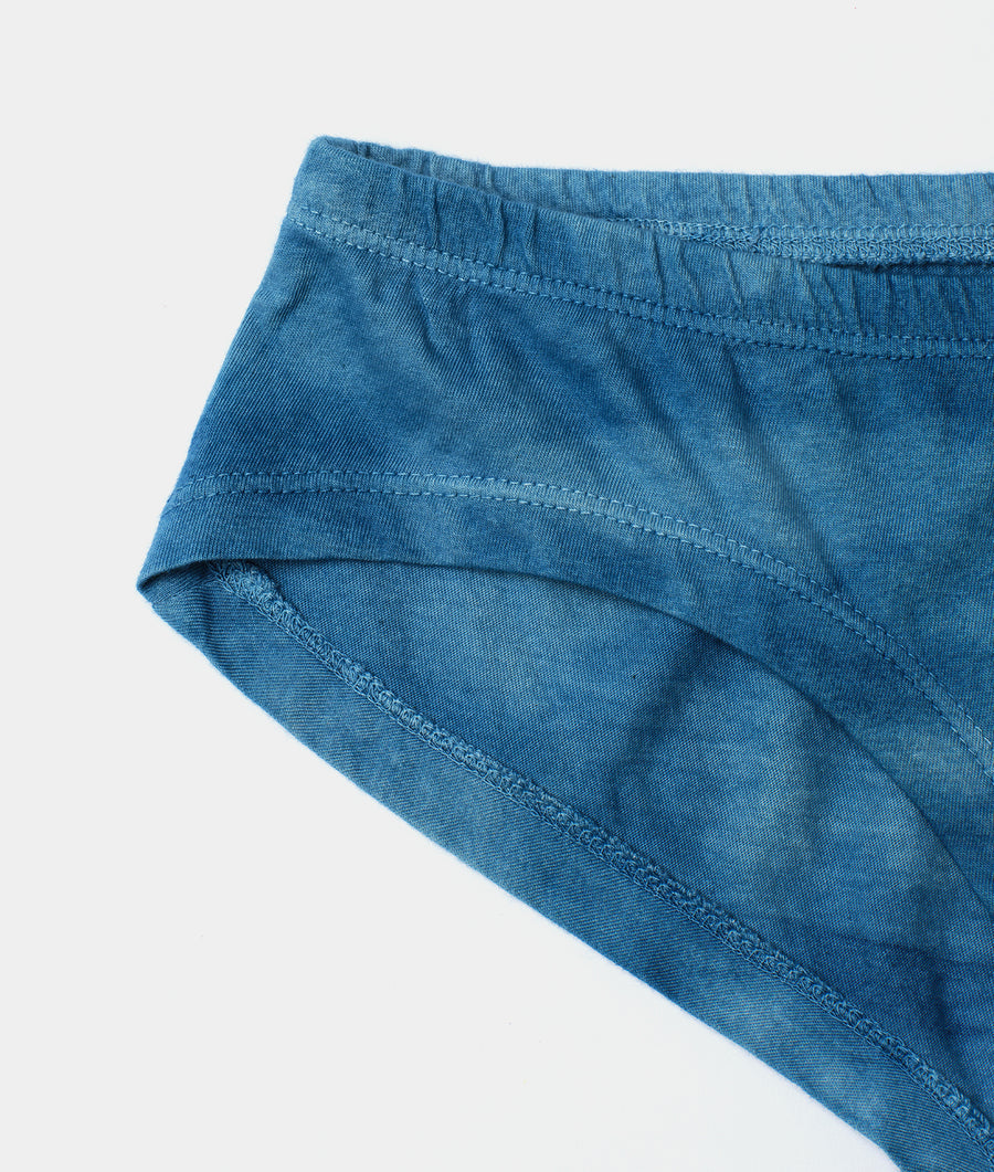 Close-up detail shot of a pair of blue organic cotton briefs - Industry of All Nations